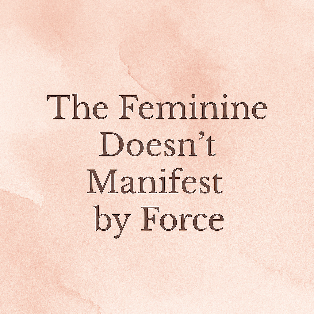 A soft digital image with a warm blush-pink watercolor background and gentle tonal variations. Centered in elegant serif font is the phrase “The Feminine Doesn’t Manifest by Force,” conveying a message of surrender and sacred feminine wisdom in a calm, grounded visual style.