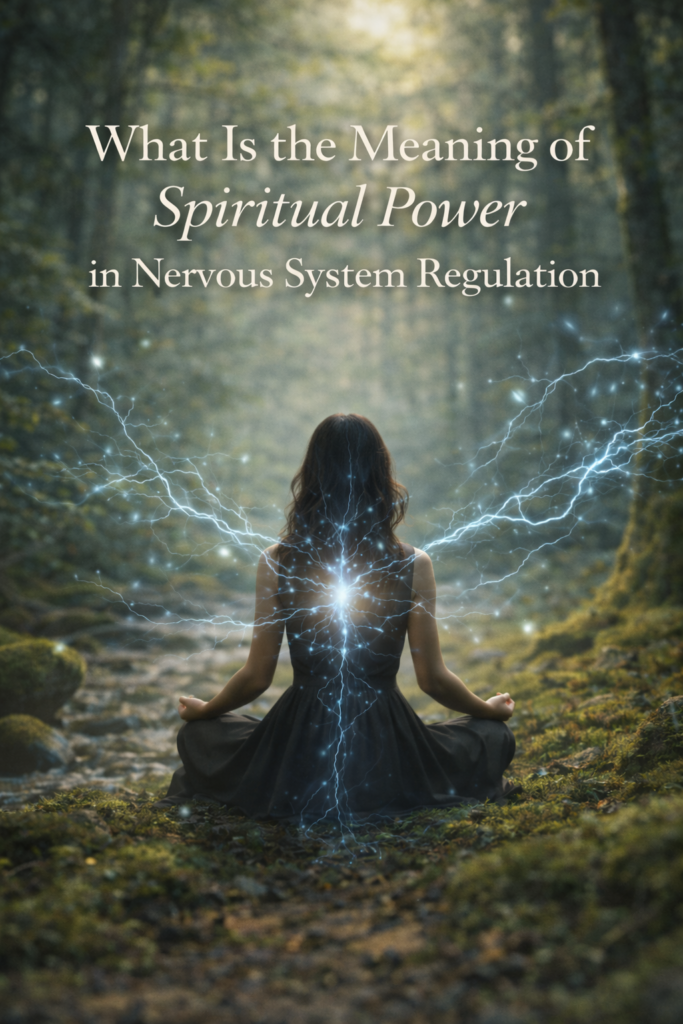 A woman seen from behind sits in meditation on a mossy forest path. Soft light filters through the trees, and delicate blue-white energy lines radiate from the center of her spine, symbolising calm, regulated nervous system energy. Overlaid text reads, “What Is the Meaning of Spiritual Power in Nervous System Regulation.”